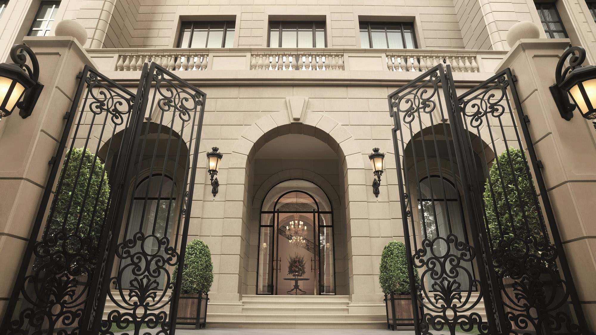 Wrought-iron entrance gates and limestone facade (rendering)